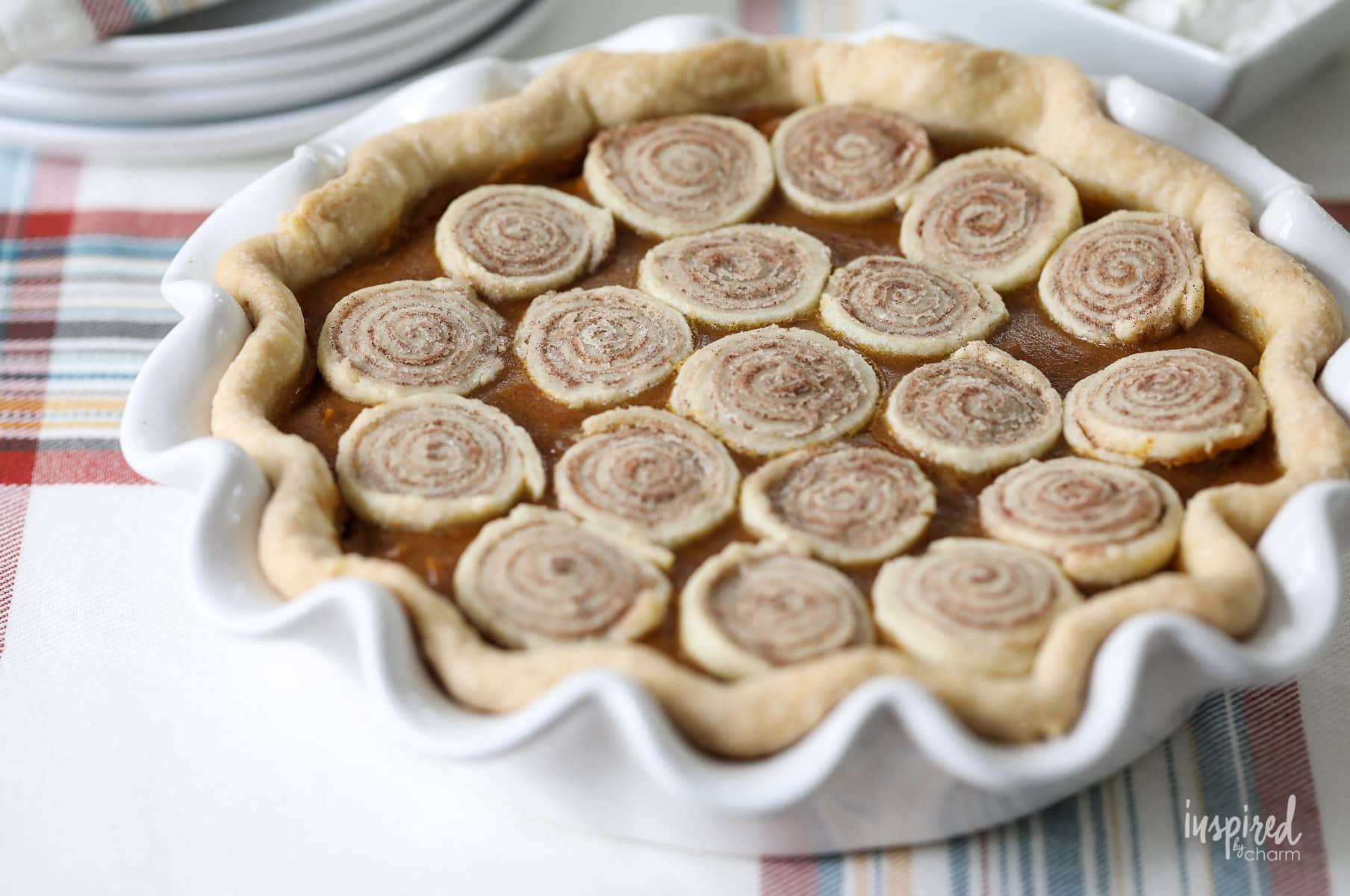 This Cinnamon Roll Butternut Squash Pie is a unique and delicious fall dessert recipe! #butternutsquash #fall #baking #dessert #pie #recipe #thanksgiving #friendsgiving