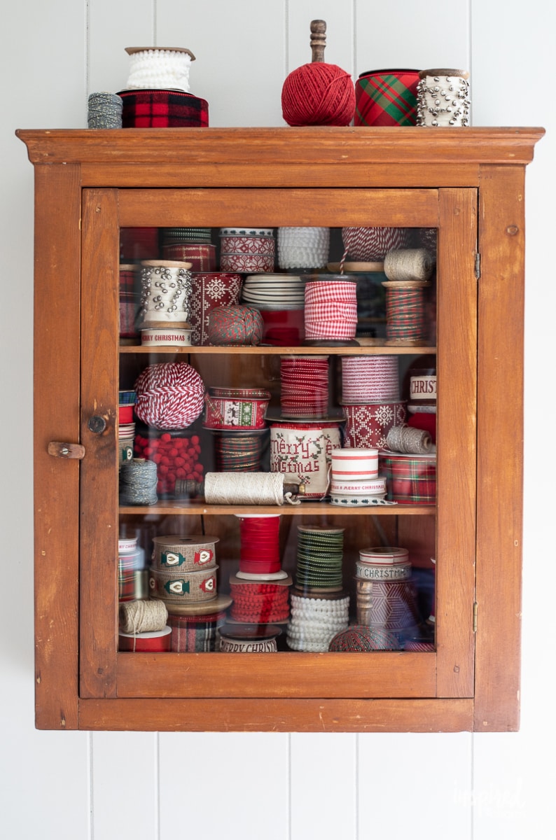 My Christmas Ribbon Cabinet #christmas #ribbon #wrapping #decor #decorations #holiday #christmasribbon 