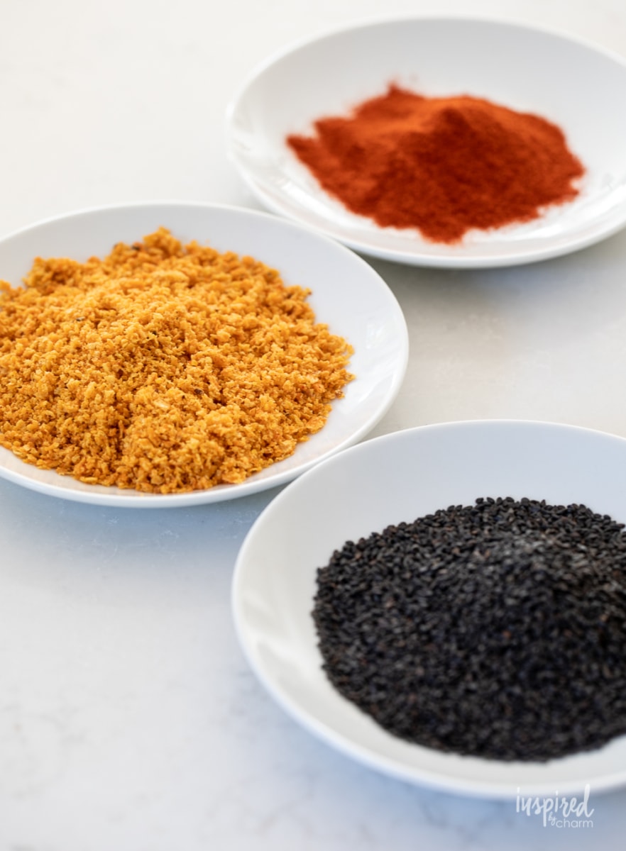 topping for Mini Pumpkin Cheese Balls on three plates.