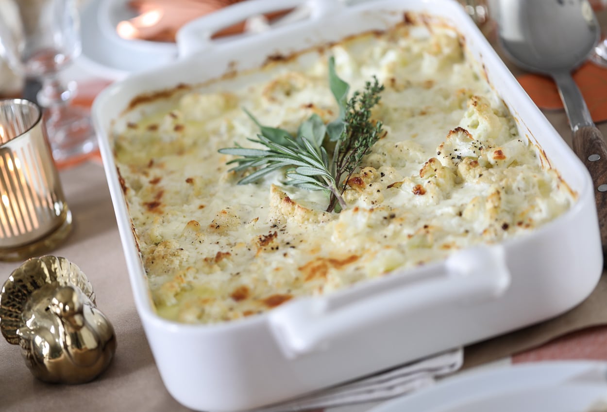 This Cheesy Cauliflower Gratin makes the most delicious holiday side dish. #cauliflower #vegetable #sidedish #recipe #thanksgiving #christmas