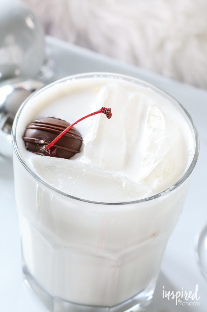 Cherry Amaretto Cocktail with ice and cherry garnish.