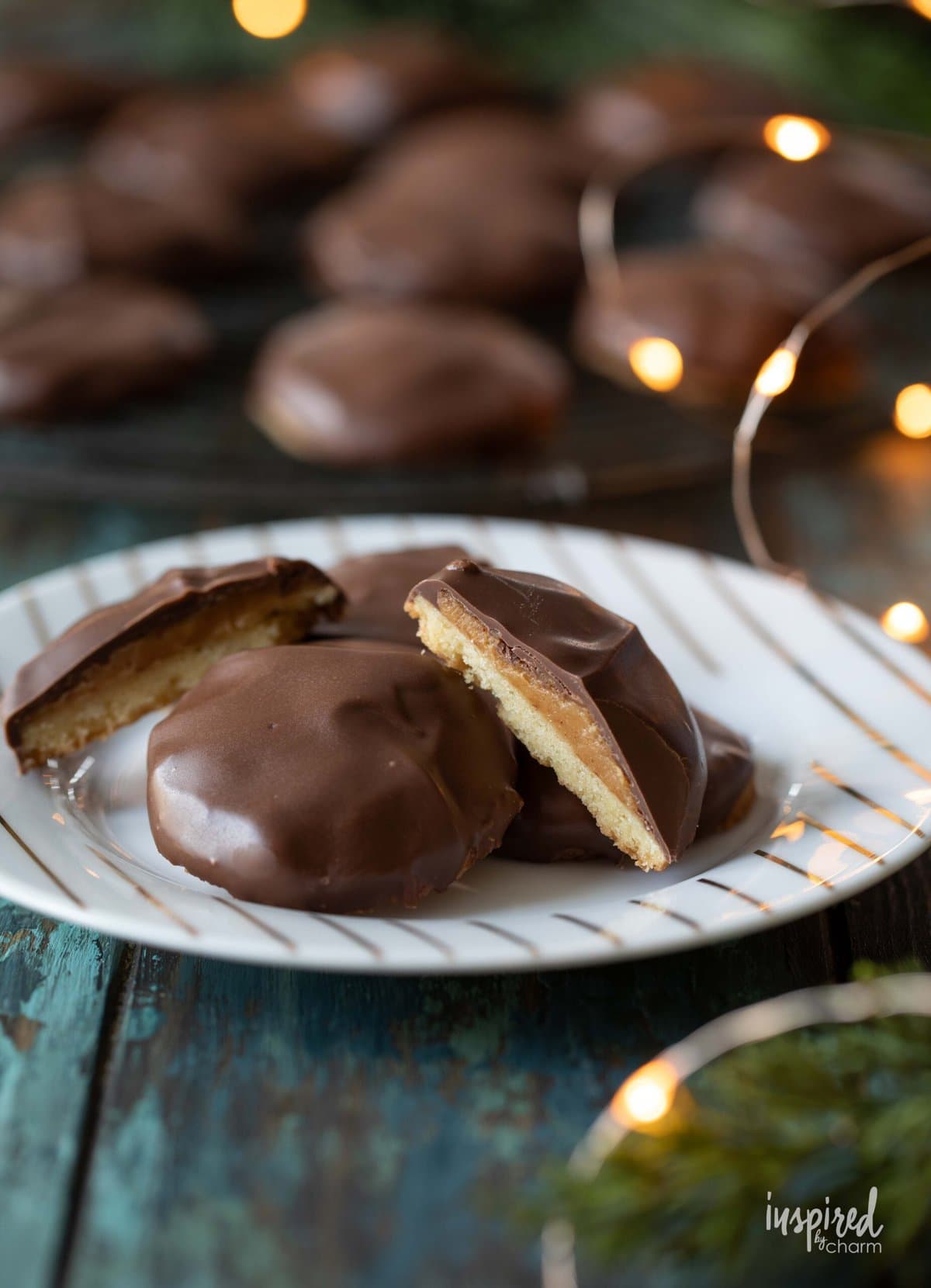 Chocolate Covered Peanut Butter Cookies on a plate.