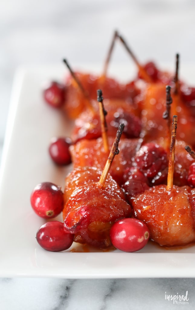 bacon wrapped water chestnuts in a cranberry glaze