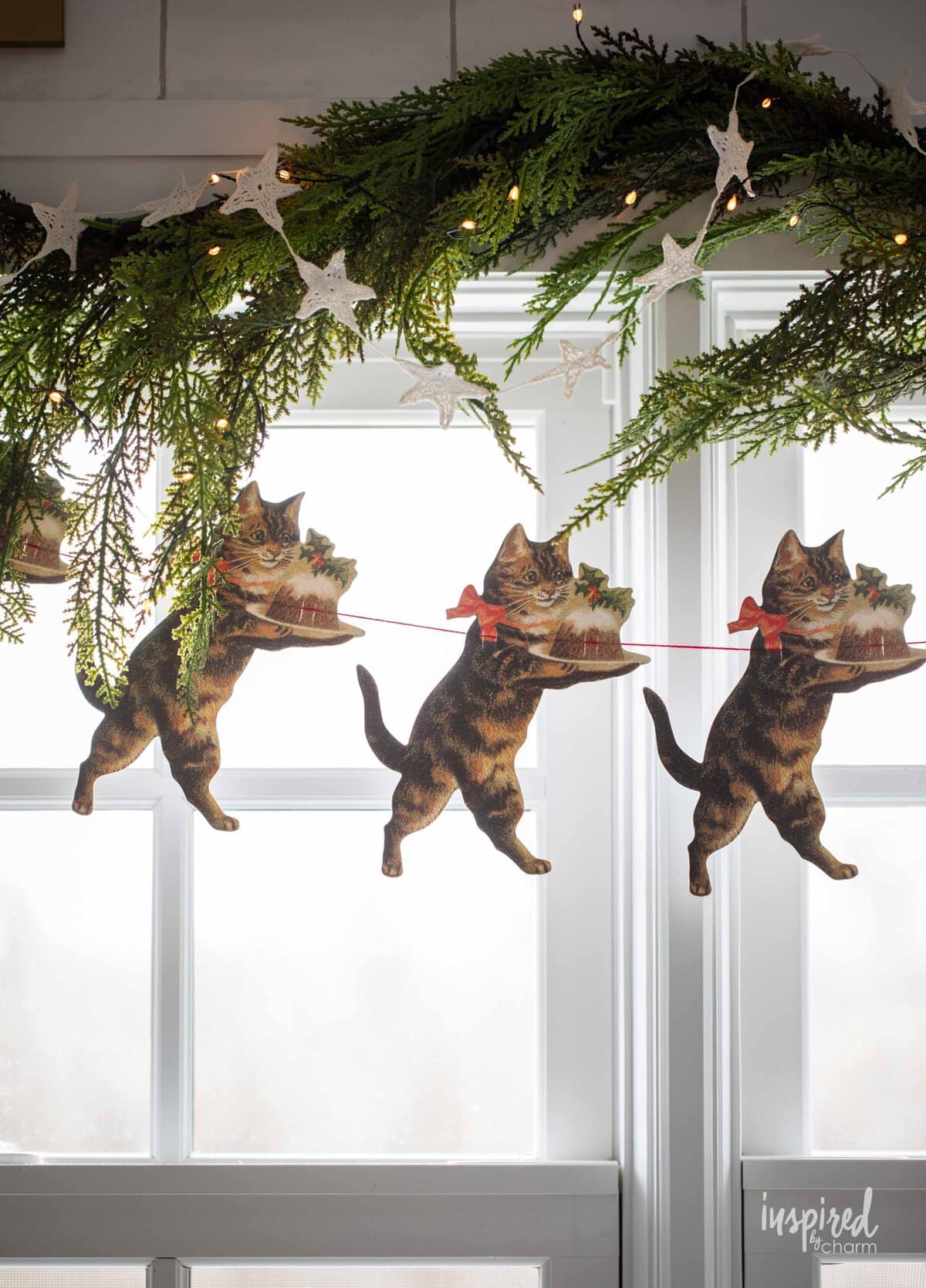 paper garland with christmas cats.
