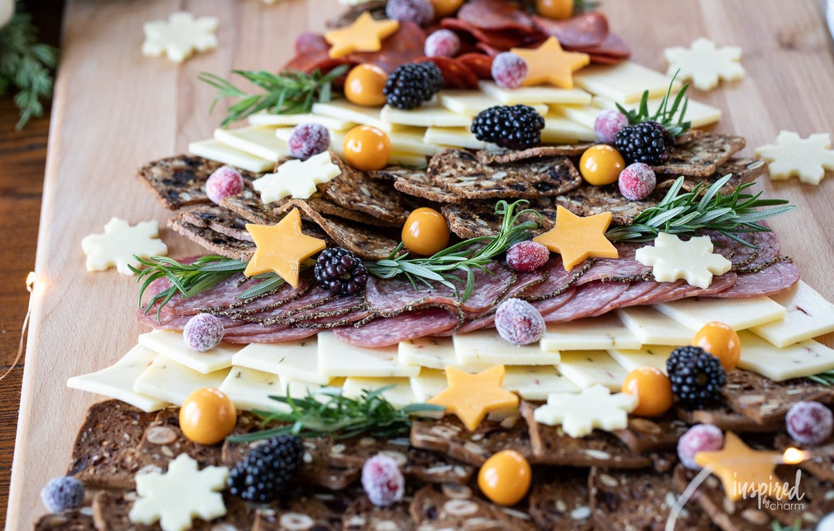 Christmas Cheese Board shared like a tree on a table.