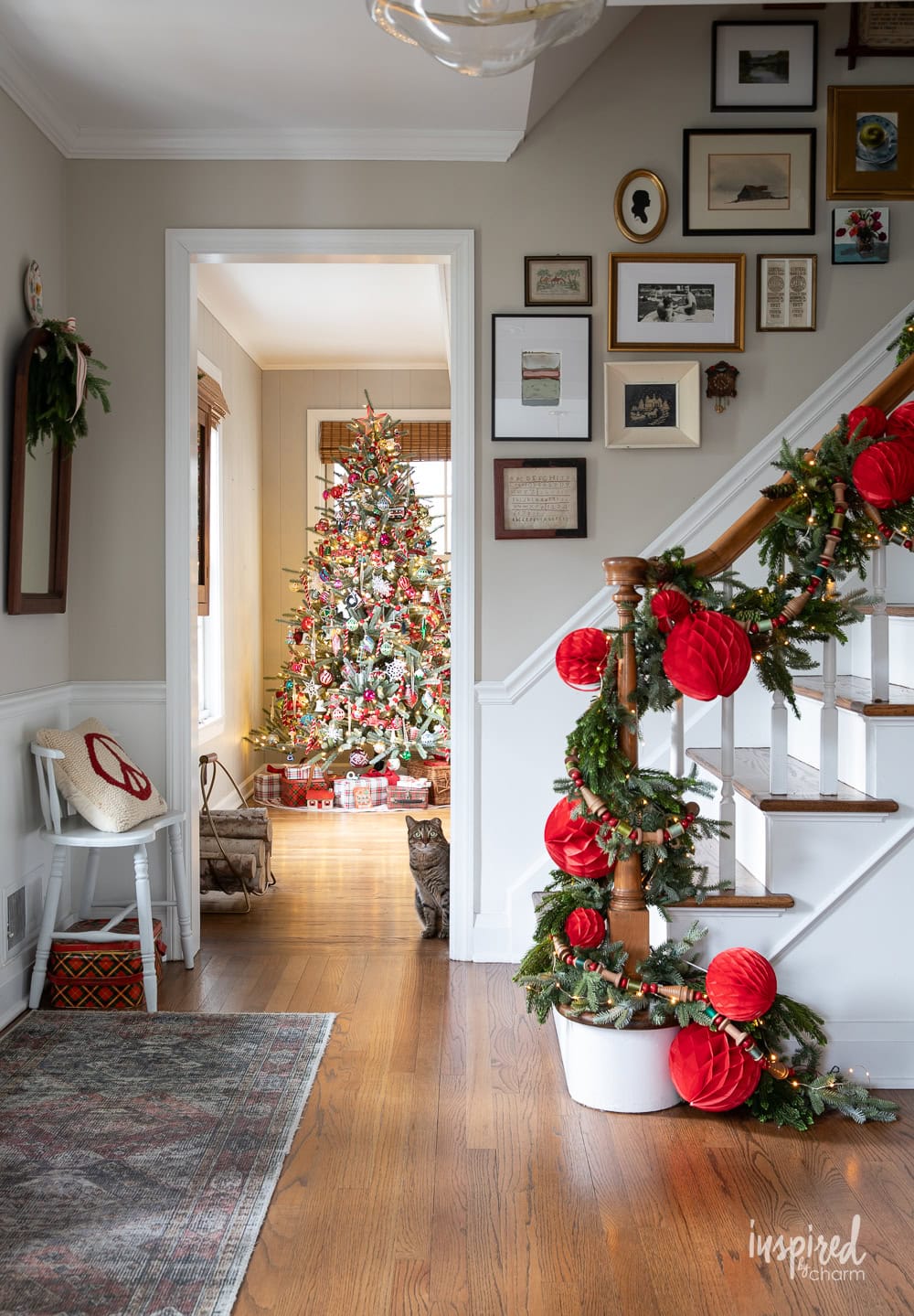 christmas tree with entryway and a cat.