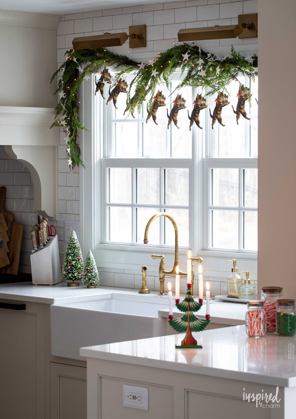 kitchen window decorated with garland. 