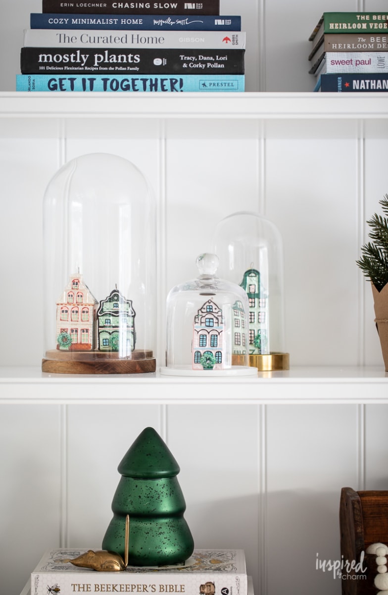 Living Room Christmas Mantel Decor #livingroom #mantel #christmas #fireplace #holiday #decor #bookshelf #bookcase #garland