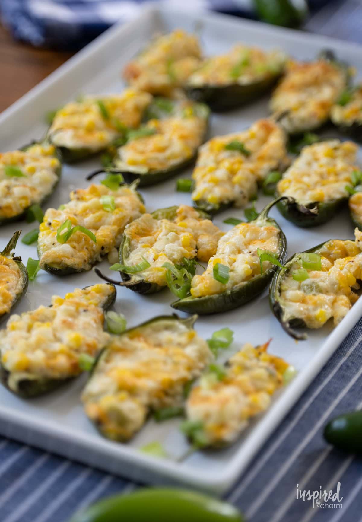platter of jalapeños stuffed with cheese and fresh corn.