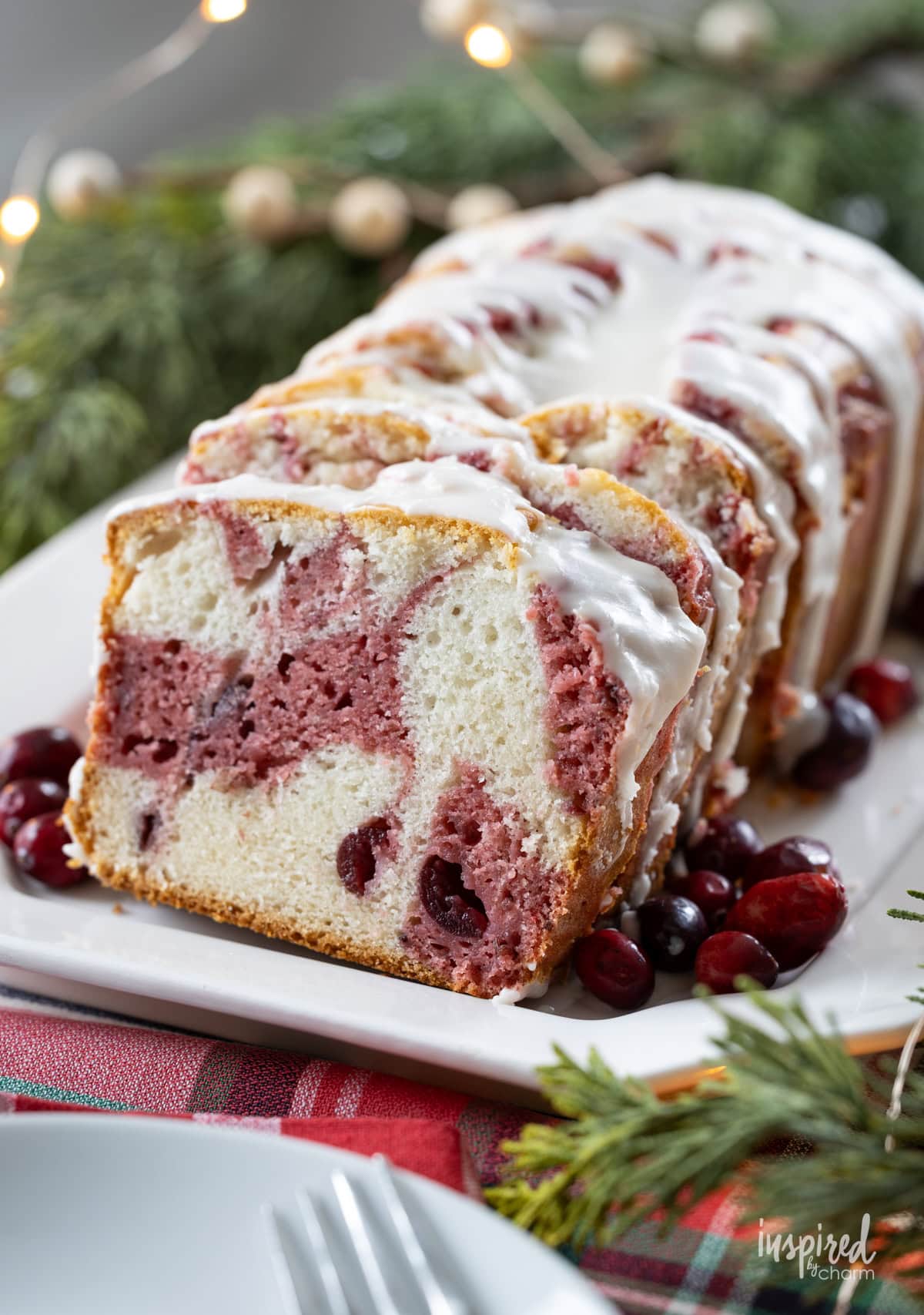 Cranberry Marble Loaf Cake on a white plate.