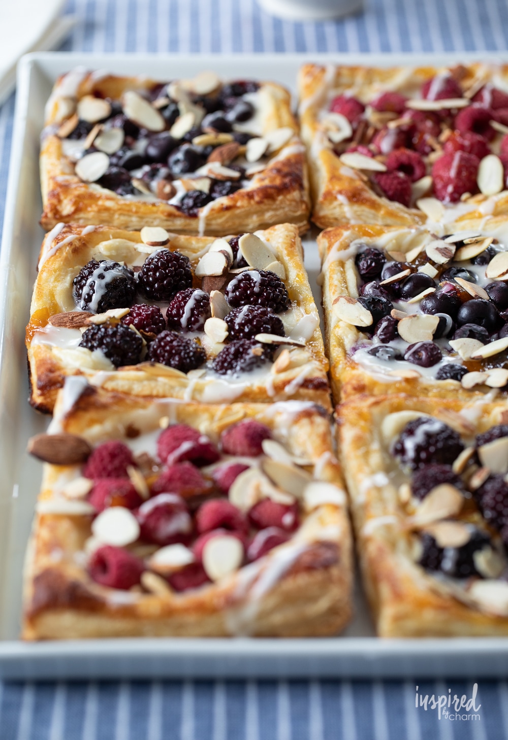 platter of berry topped cream cheese danish.