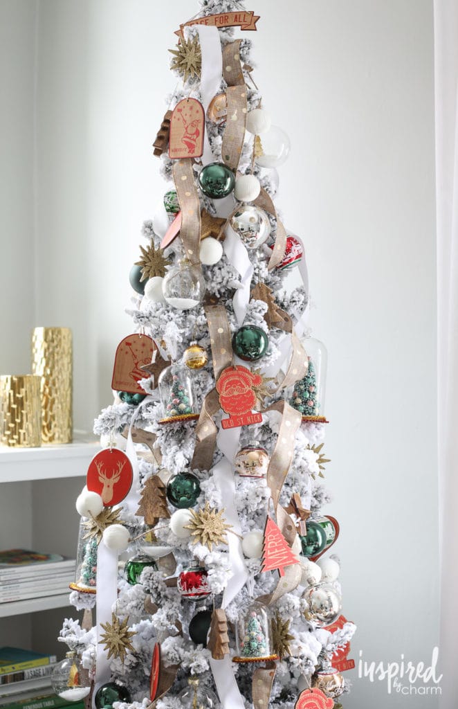 flocked tree with unique ornament finds