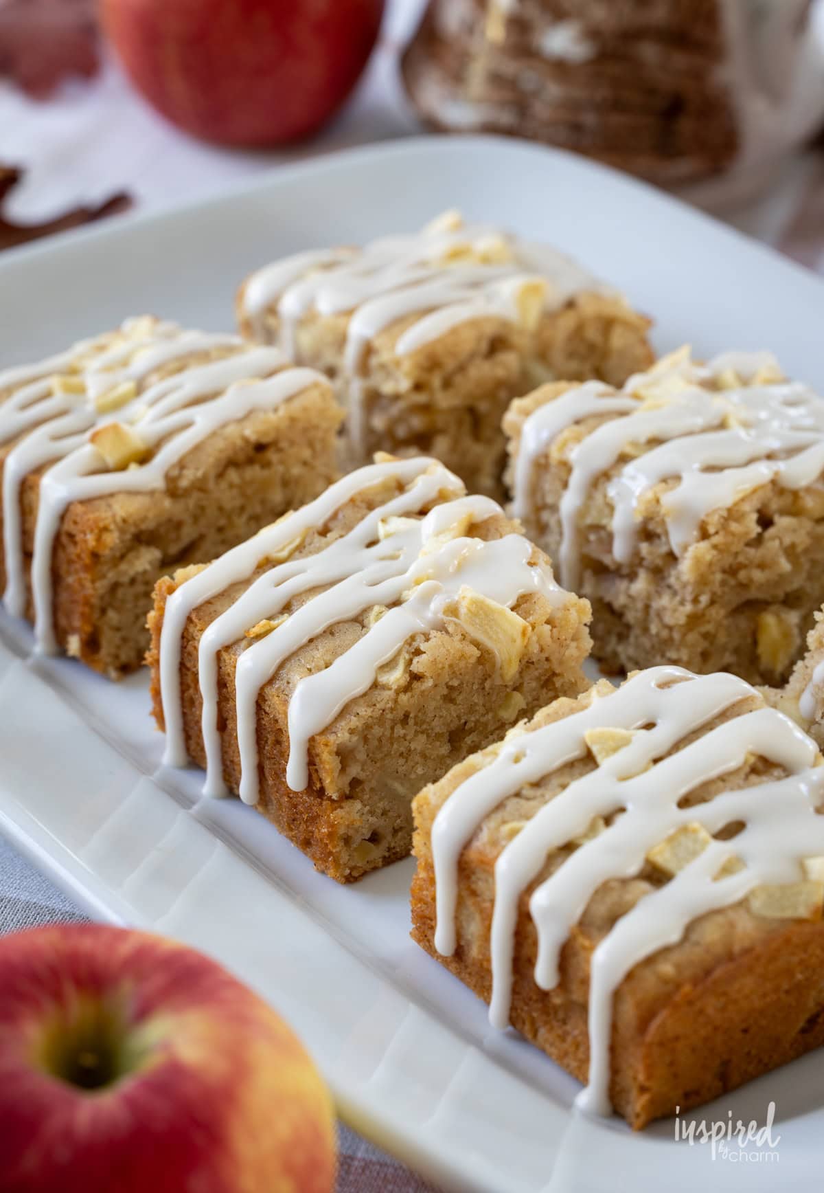 Easy Apple Snack Cake slices on a white platter.