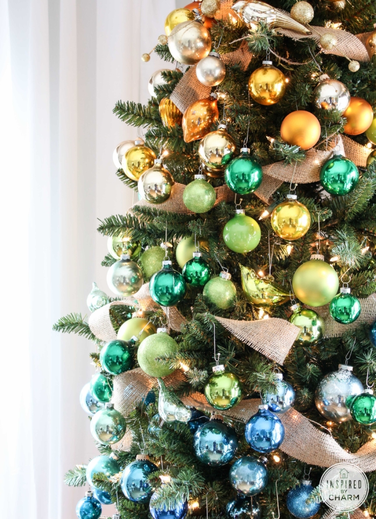 gold green and blue bulbs on a tree