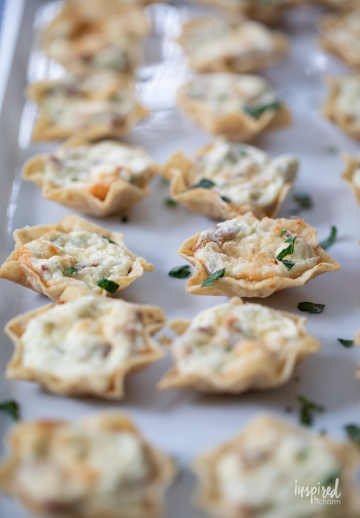 Jalapeño Bacon Cheese Bites arranged on a platter.