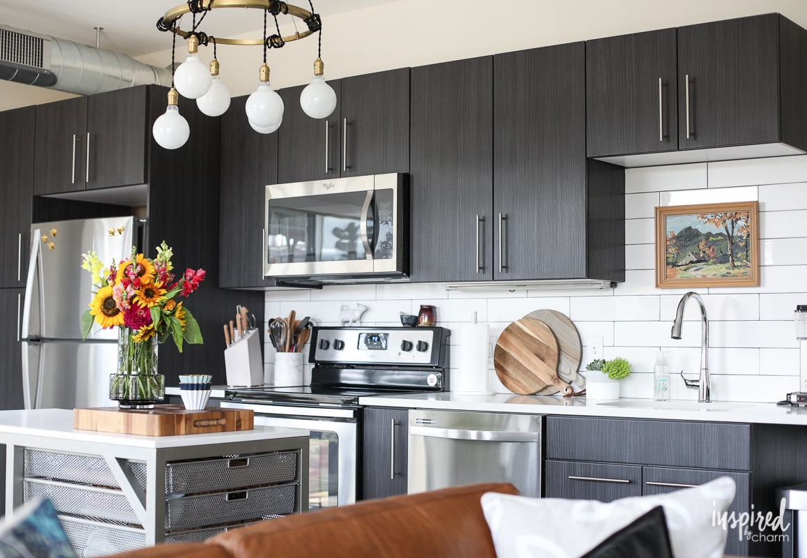 Tips and Ideas for styling and stocking an apartment kitchen. | Inspired by Charm