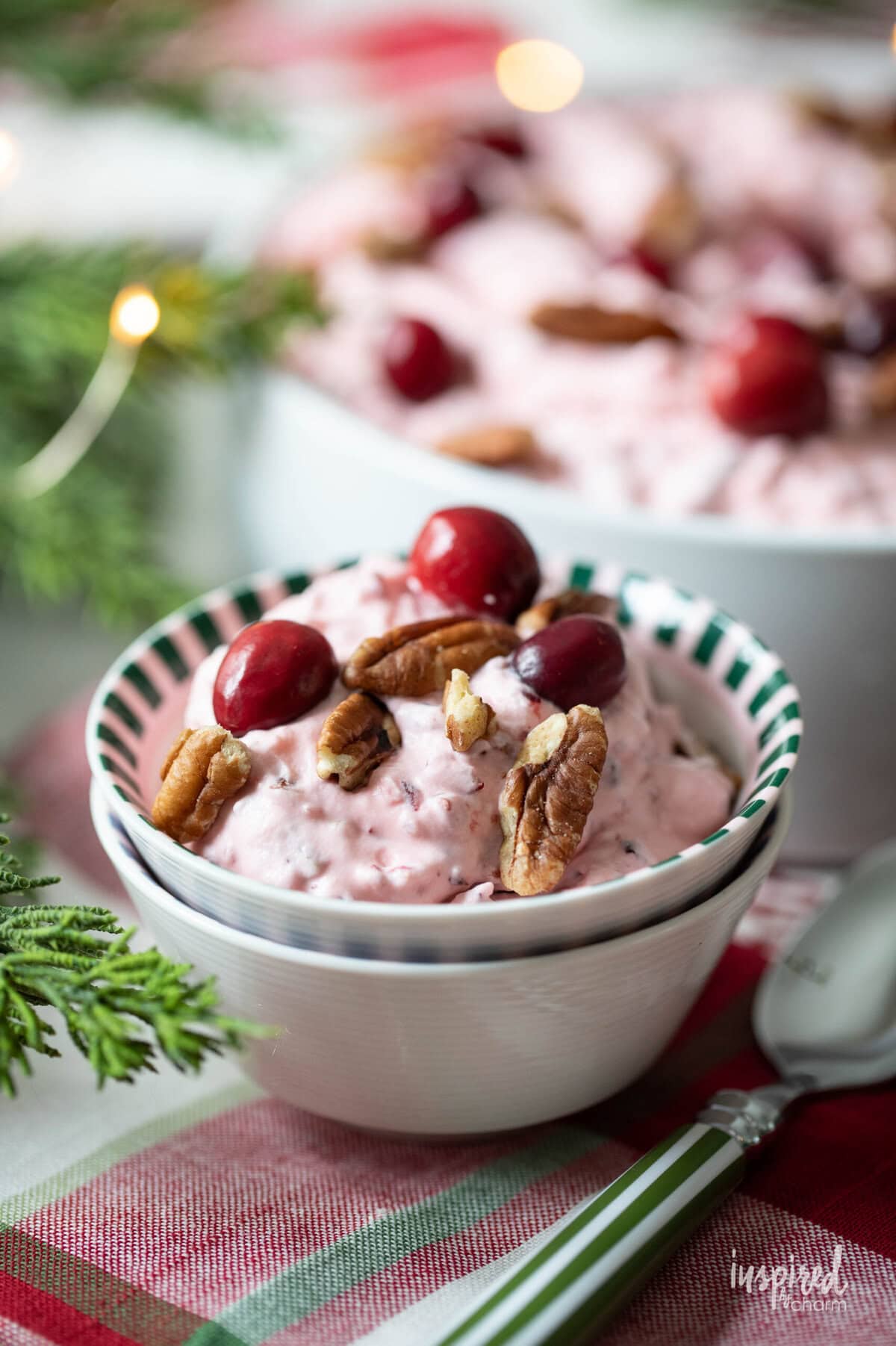small dish of cranberry fluff salad on a napkin.
