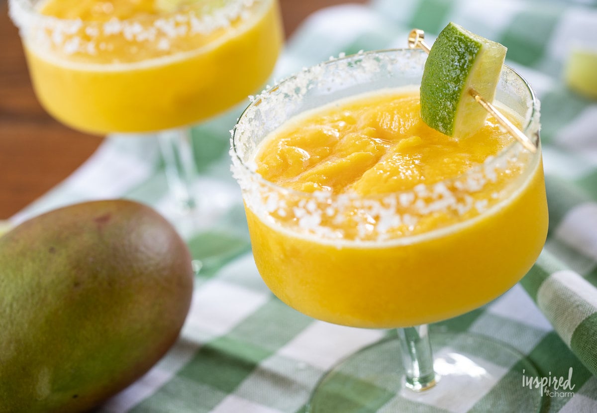 mango margaritas in glasses.