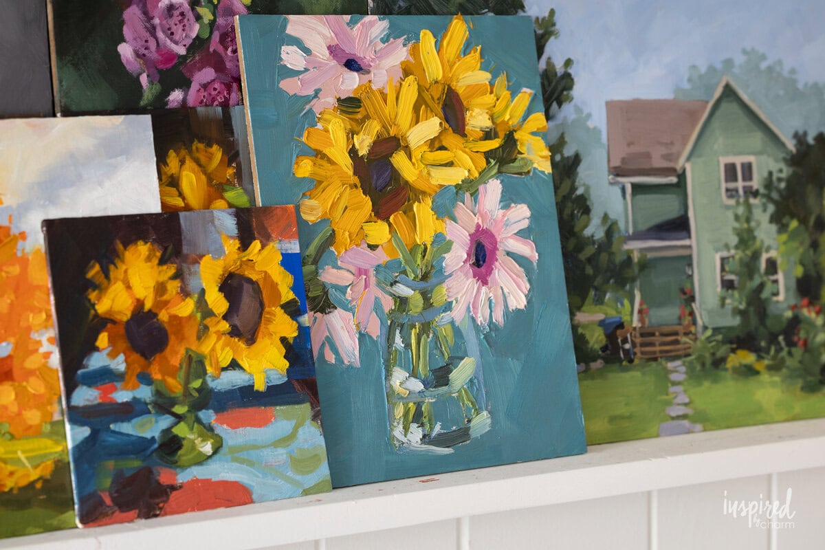 original artist oil paintings by Michael Wurm Jr. on a shelf.