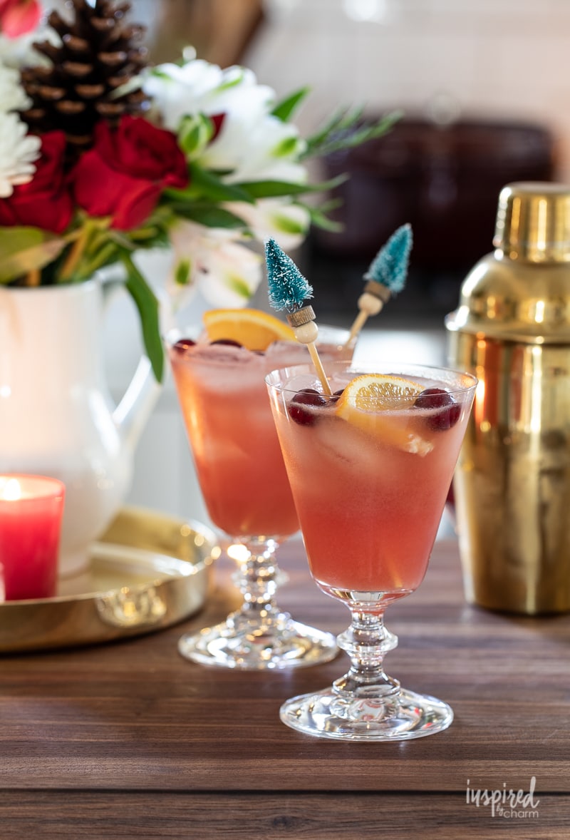 2 cocktails with gold shaker in the backgroud