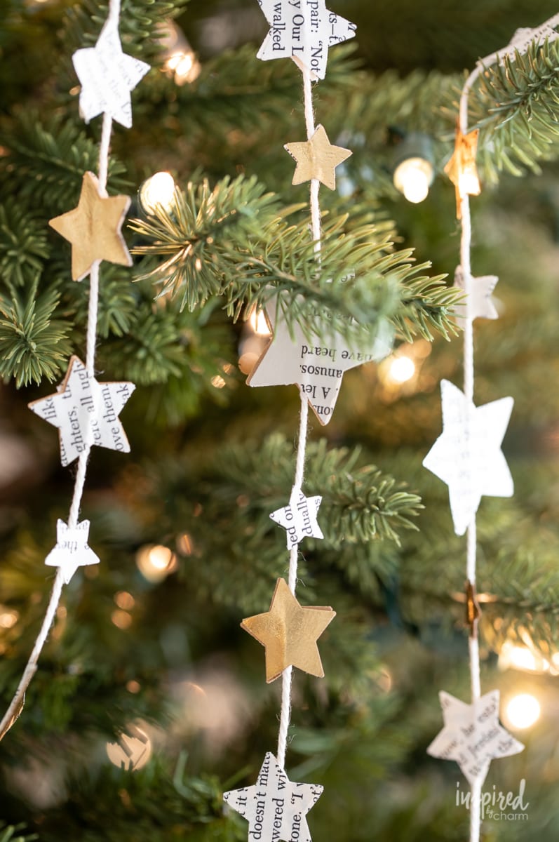 diy garland with string and paper stars on a tree. 
