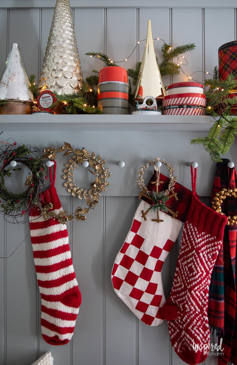 entry shelves and peg rail decorated for Christmas.