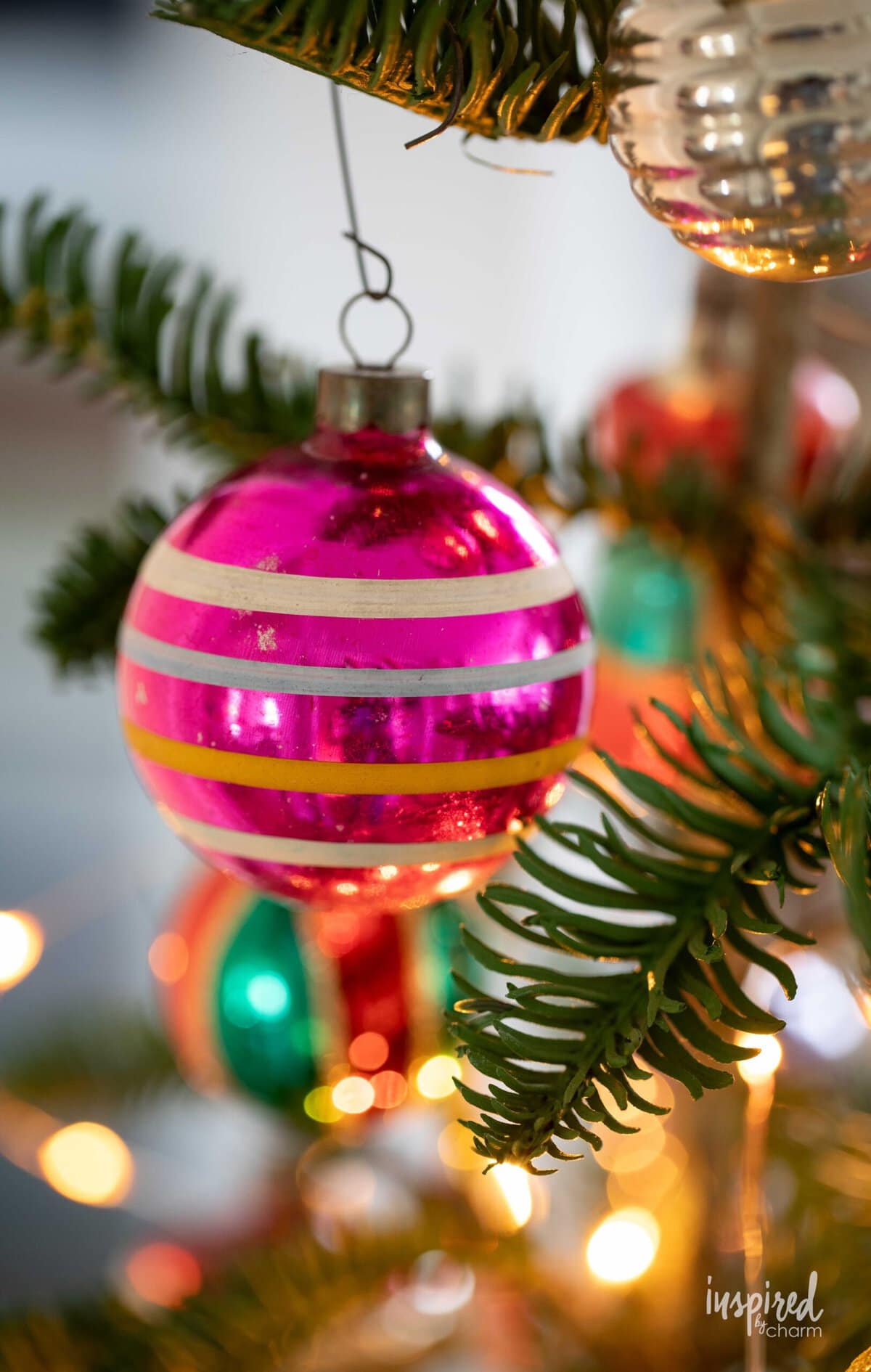 pink vintage christmas ornament on a tree.