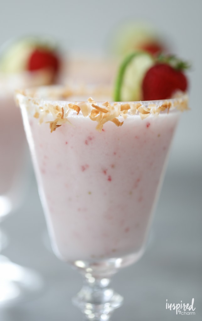 Strawberry coconut margaritas with toasted coconut rim