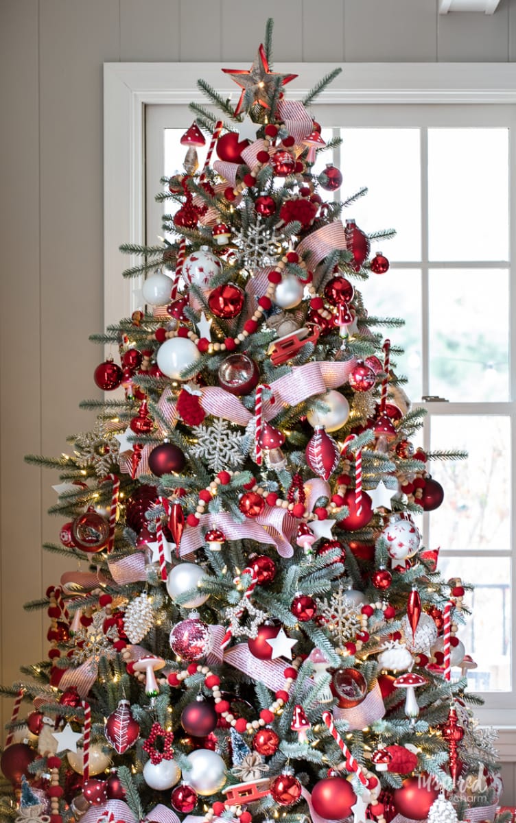 Christmas tree decorating ideas - use mushroom ornaments along with beaded garland, red and white ornaments, and ribbon to create a beautiful look. 