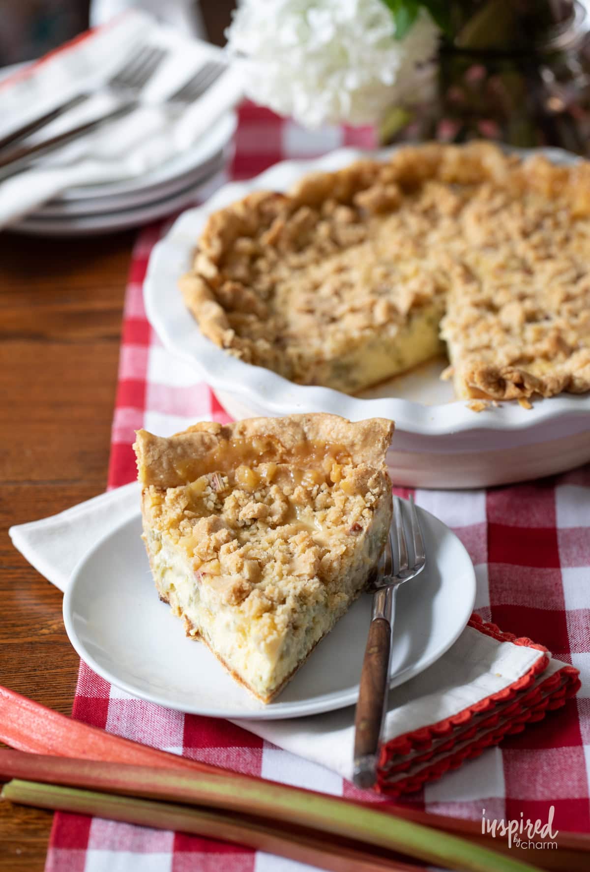 rhubarb custard pie with a pie of pie on a plate.