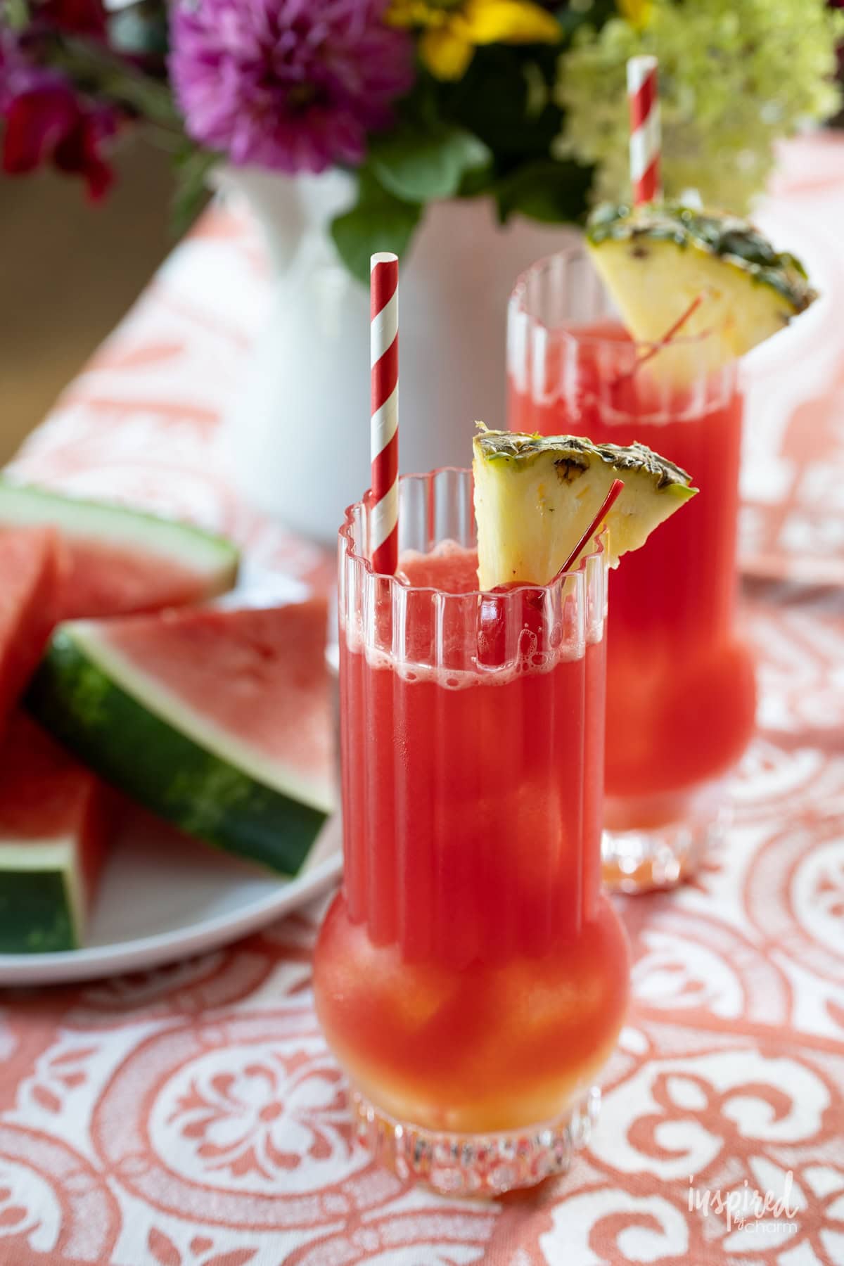 sailors warning cocktail in glasses with pineapple wedge.