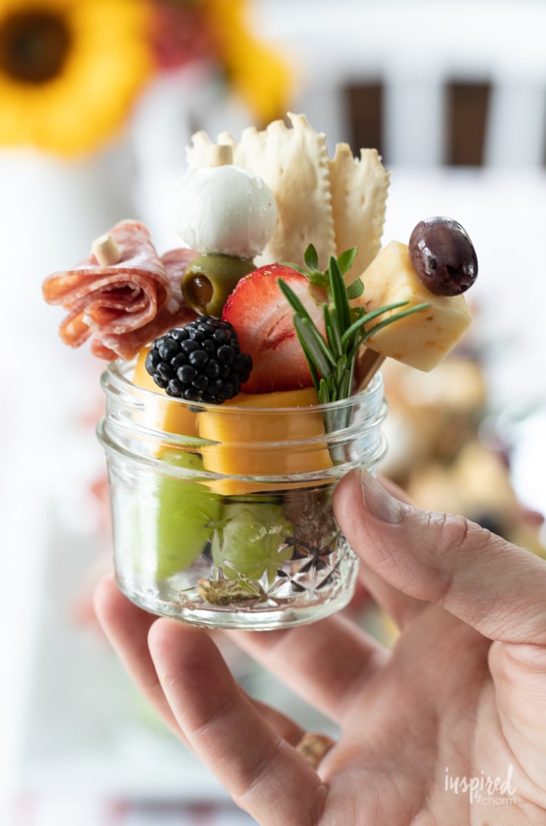 hand holding a Jarcuterie