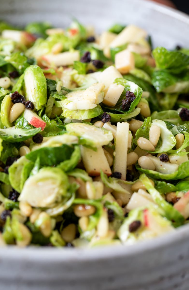 Shaved Brussels Sprout Salad with apples, pecorino, currants, and pine nuts.