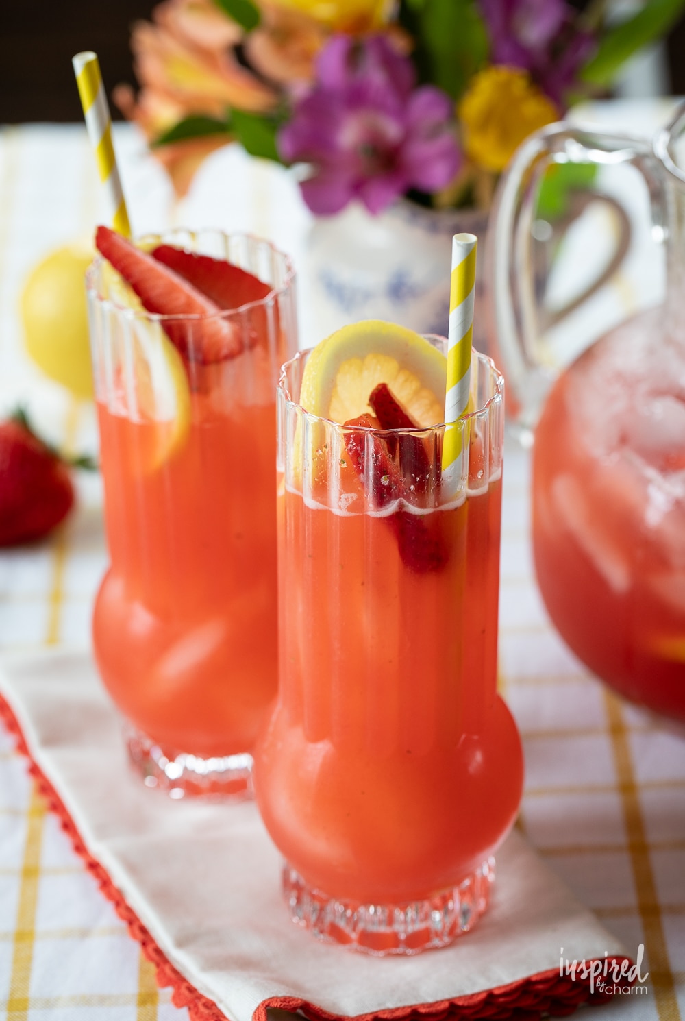 Strawberry Lemonade Vodka Cocktail in glasses on a napkin.