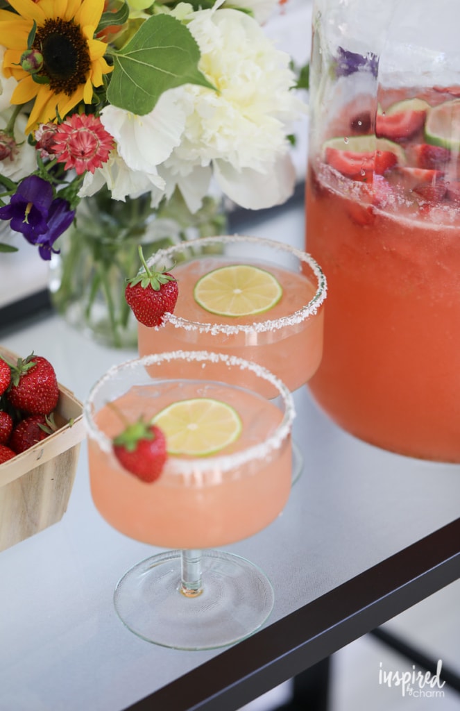 two glasses of Strawberry Margarita Punch with salted rim.
