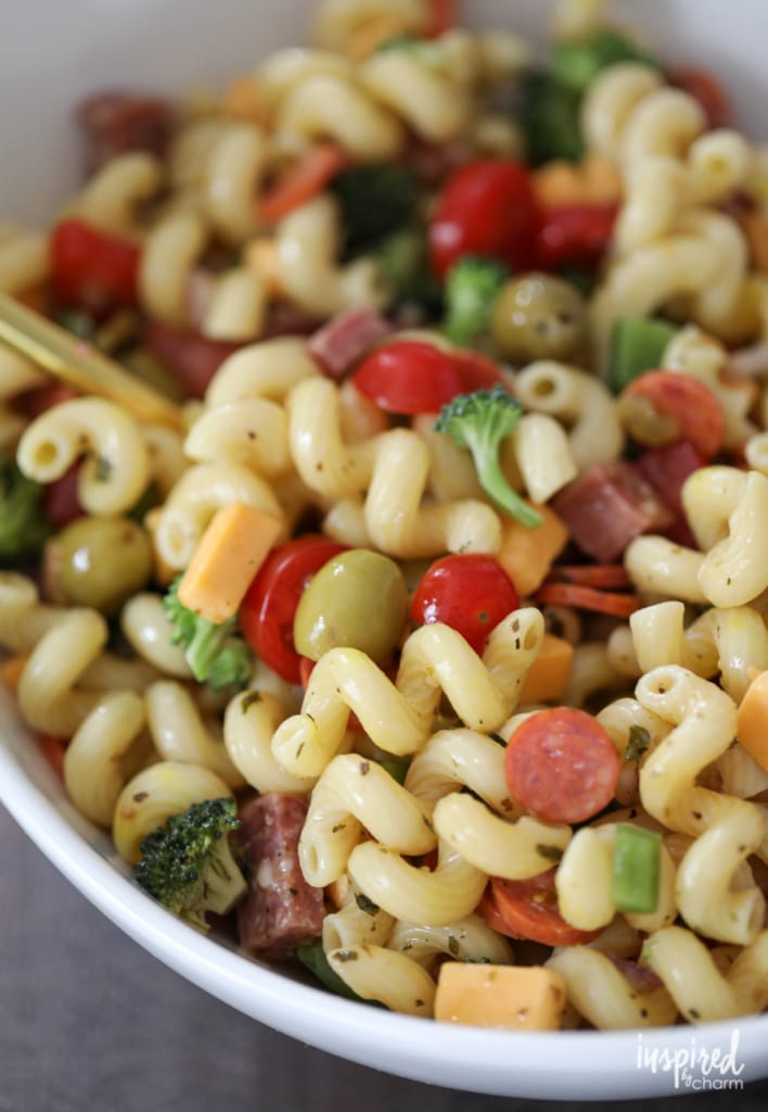 pasta salad served in a large white bowl.
