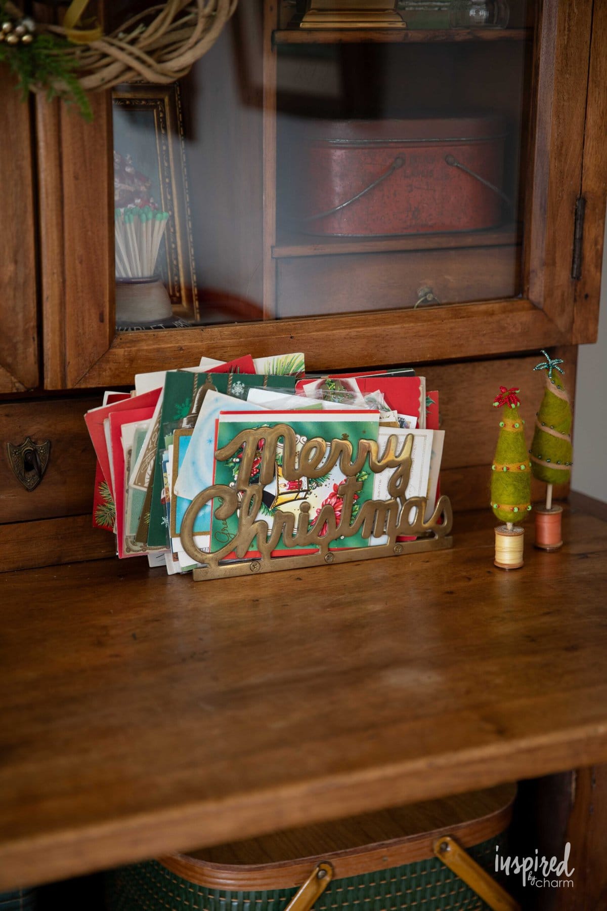 vintage brass merry christmas card holder and felt trees.