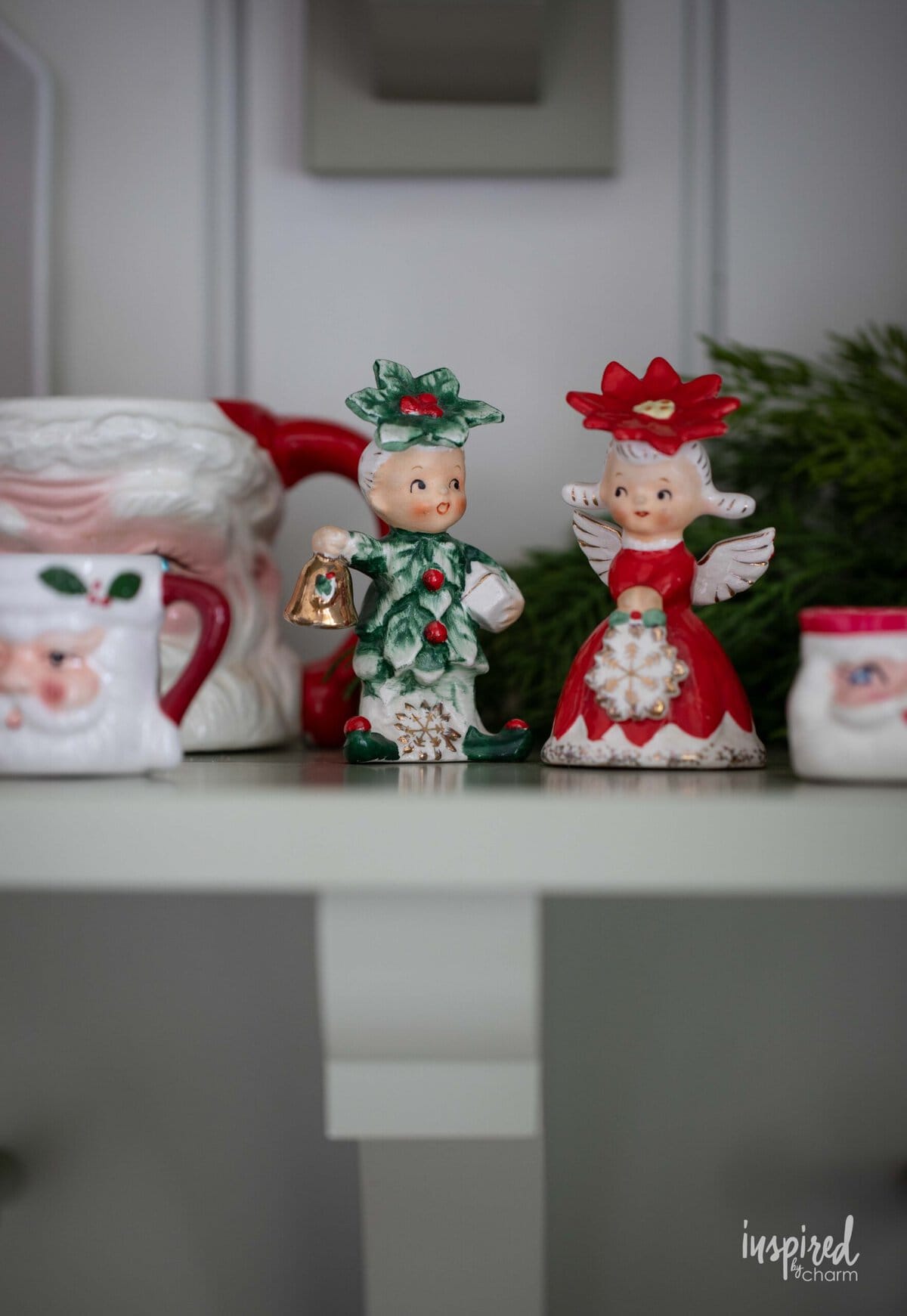 vintage poinsettia boy and girl salt and pepper shakers.