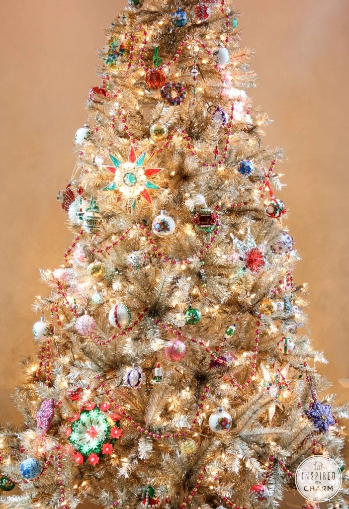 shiny artificial tree with vintage ornament finds