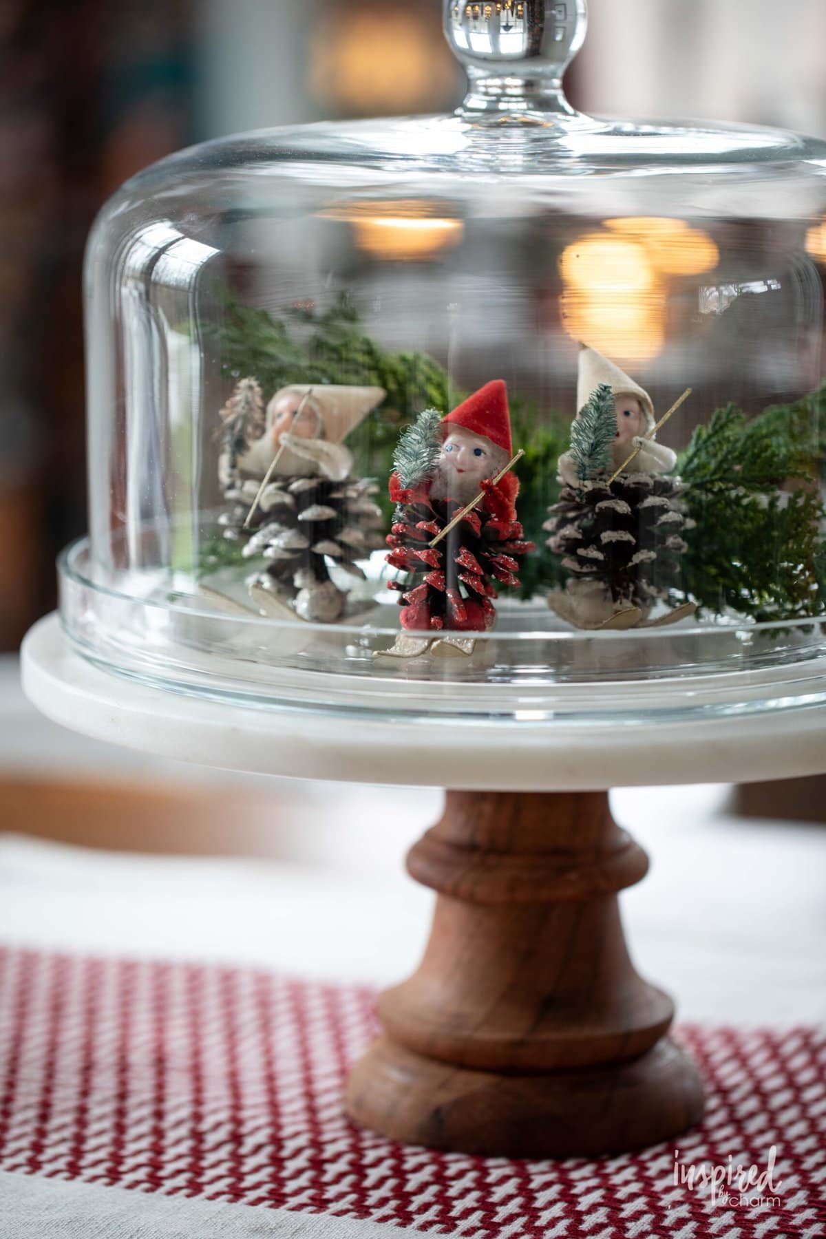 cake stand with vintage pinecone elves