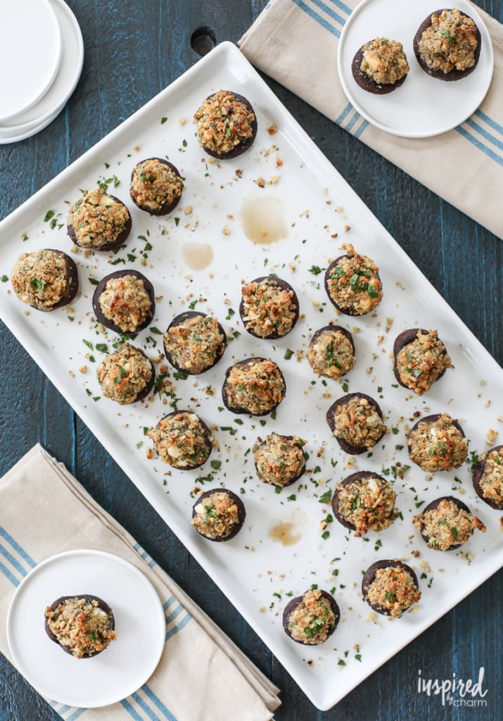 large serving platter filled with Walnut and Blue Cheese-Stuffed Mushrooms.