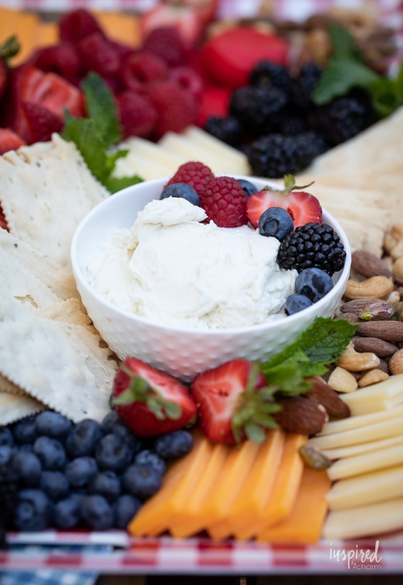 whipped honey goat cheese spread in bowl.